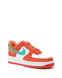 Baskets basses en cuir orange Nike