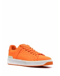 Baskets basses en cuir orange Balmain