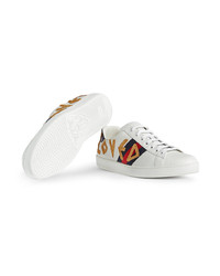 Baskets basses en cuir ornées blanches Gucci