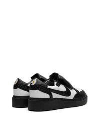 Baskets basses en cuir ornées noires Nike