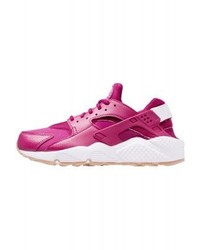 Baskets basses en cuir pourpres Nike