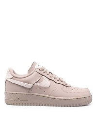 Baskets basses en cuir roses Nike