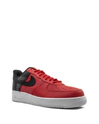 Baskets basses en cuir rouge et noir Nike