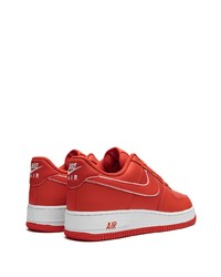 Baskets basses en cuir rouges Nike