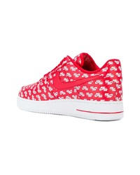 Baskets basses en cuir rouges Nike