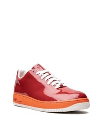 Baskets basses en cuir rouges Nike