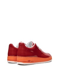 Baskets basses en cuir rouges Nike