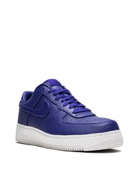 Baskets basses en cuir violettes Nike