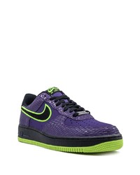 Baskets basses en cuir violettes Nike