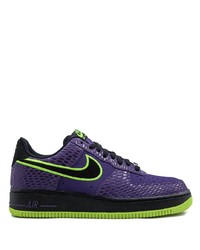 Baskets basses en cuir violettes Nike