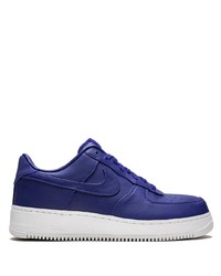 Baskets basses en cuir violettes Nike