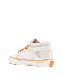 Baskets basses en daim blanches Vans