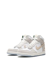 Baskets basses en daim blanches Nike