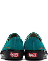 Baskets basses en daim bleu canard Vans