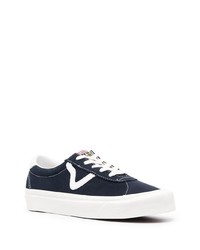 Baskets basses en daim bleu marine et blanc Vans