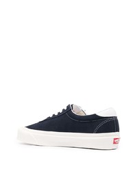 Baskets basses en daim bleu marine et blanc Vans