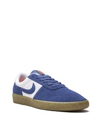 Baskets basses en daim bleu marine et blanc Nike