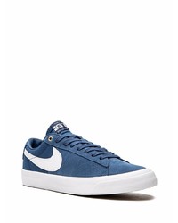 Baskets basses en daim bleu marine et blanc Nike