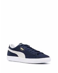 Baskets basses en daim bleu marine et blanc Puma