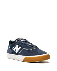 Baskets basses en daim bleu marine New Balance