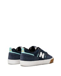 Baskets basses en daim bleu marine New Balance