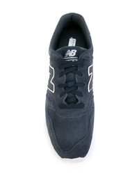 Baskets basses en daim bleu marine New Balance