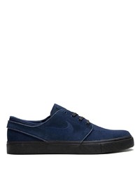 Baskets basses en daim bleu marine Nike