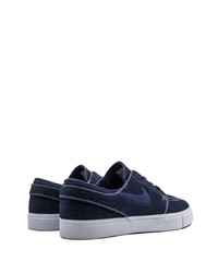 Baskets basses en daim bleu marine Nike