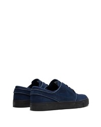 Baskets basses en daim bleu marine Nike