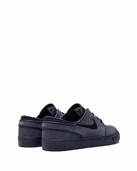 Baskets basses en daim bleu marine Nike