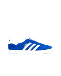 Baskets basses en daim bleues adidas