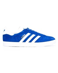 Baskets basses en daim bleues adidas