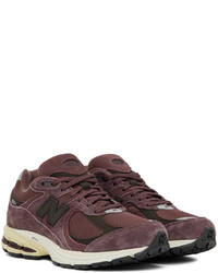 Baskets basses en daim bordeaux New Balance