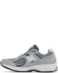 Baskets basses en daim grises New Balance