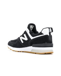 Baskets basses en daim noires et blanches New Balance