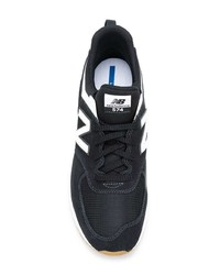 Baskets basses en daim noires et blanches New Balance