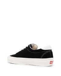 Baskets basses en daim noires et blanches Vans