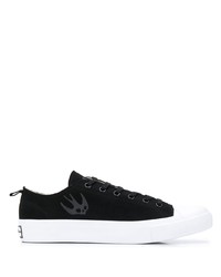 Baskets basses en daim noires et blanches McQ Swallow