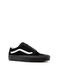 Baskets basses en daim noires et blanches Vans