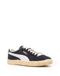 Baskets basses en daim noires et blanches Puma