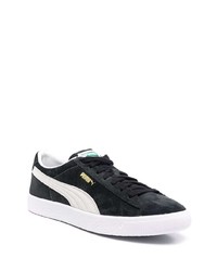 Baskets basses en daim noires et blanches Puma