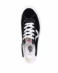 Baskets basses en daim noires et blanches Vans