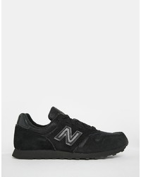 Baskets basses en daim noires New Balance