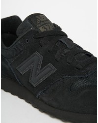 Baskets basses en daim noires New Balance