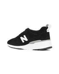 Baskets basses en daim noires New Balance