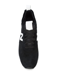 Baskets basses en daim noires New Balance