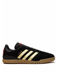 Baskets basses en daim noires adidas