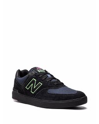 Baskets basses en daim noires New Balance