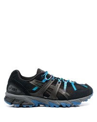 Baskets basses en daim noires Asics