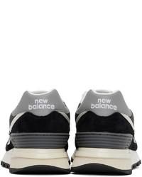 Baskets basses en daim noires New Balance